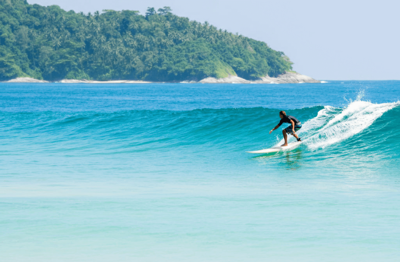 A man experiencing the unique feeling of hydrofoil surf above the waves